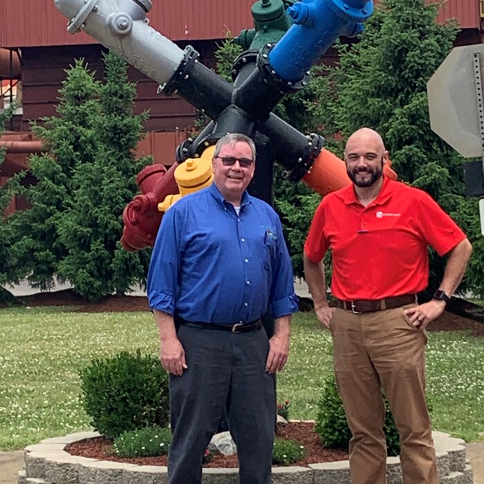 Pictured L-R: Mike Bowles and General Manager Nate Pizzini